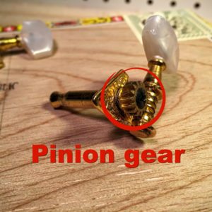 pinion gear on an open gear tuner