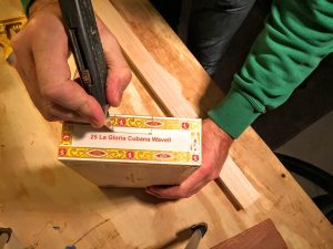 score the cigar box with a razor knife