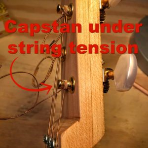 string wound around capstan of an open gear tuner